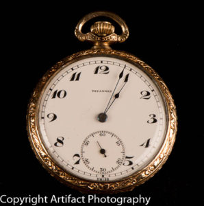 Front of gold pocket watch