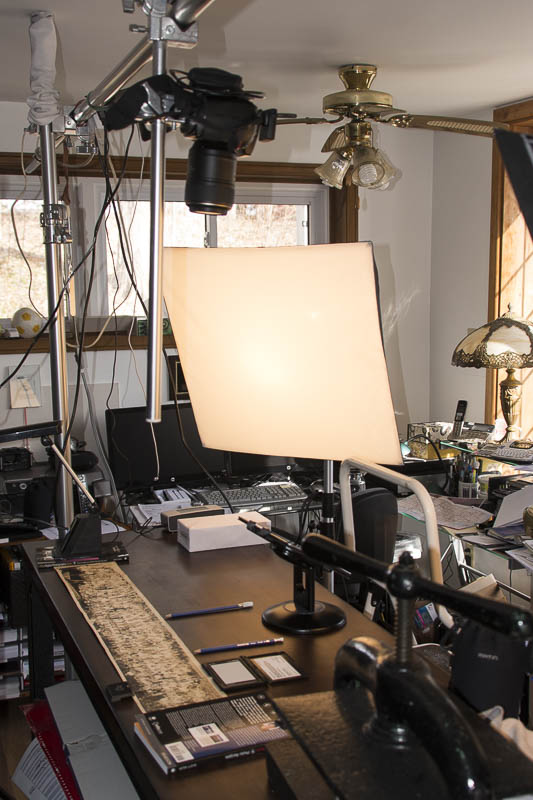 Studio setup - camera above, original below, lighting to the side